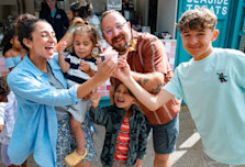 Toddler enjoying an ice cream from Haven's Seaside Treats venue
