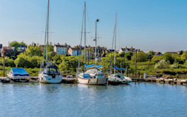 Boats moored in the creek at Oare near Faversham
