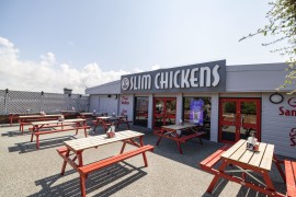 Outdoor seating area of Slim Chickens