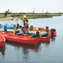 The jetty at the lake and canadian canoes