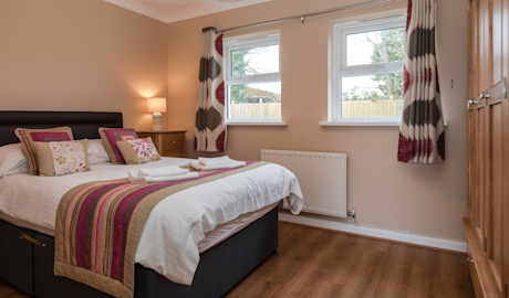 Example of the cottage's main bedroom