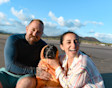 A couple with their dog