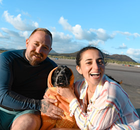 A couple with their dog