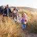 Family walking on the beach