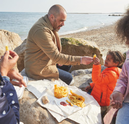 Enjoy fish and chips by the sea