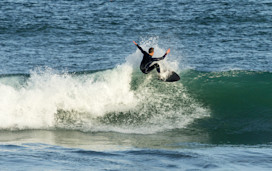 Surfer riding a wave