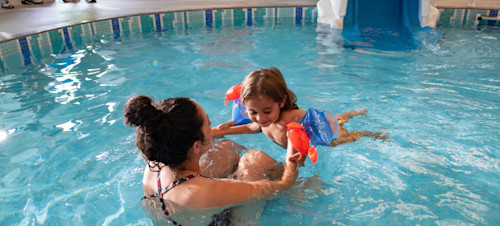 Toddler enjoying the pool at Haven