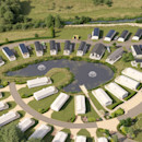 A computer-generated image shows an aerial view of Kingfisher Way and River View at Doniford Bay.