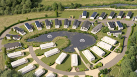 A computer-generated image shows an aerial view of Kingfisher Way and River View at Doniford Bay.