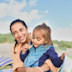 Toddler enjoying a beach with her mum at Haven