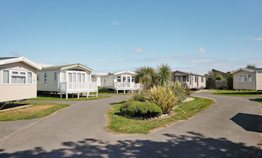 One of the lovely landscaped holiday home areas at Church Farm.