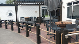 The outdoor seating area at the Ferry Boat Inn, Haven Golden Sands Holiday Park, Lincolnshire.