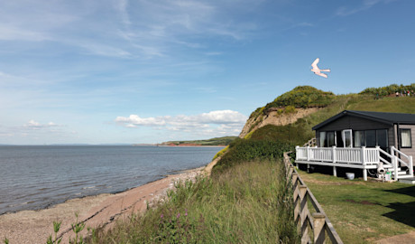 Some pitches offer views over the coastline at Doniford Bay.