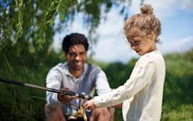 Man and child fishing