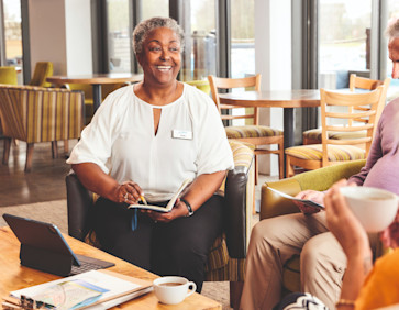 Couple speaking to a Caravan Sales advisor
