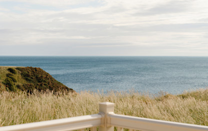 Overlooking the coast from a caravan deck at Berwick Holiday Centre