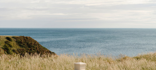 Overlooking the coast from a caravan deck at Berwick Holiday Centre