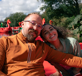 A couple on a pedalo at a Haven park