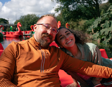 A couple on a pedalo at a Haven park