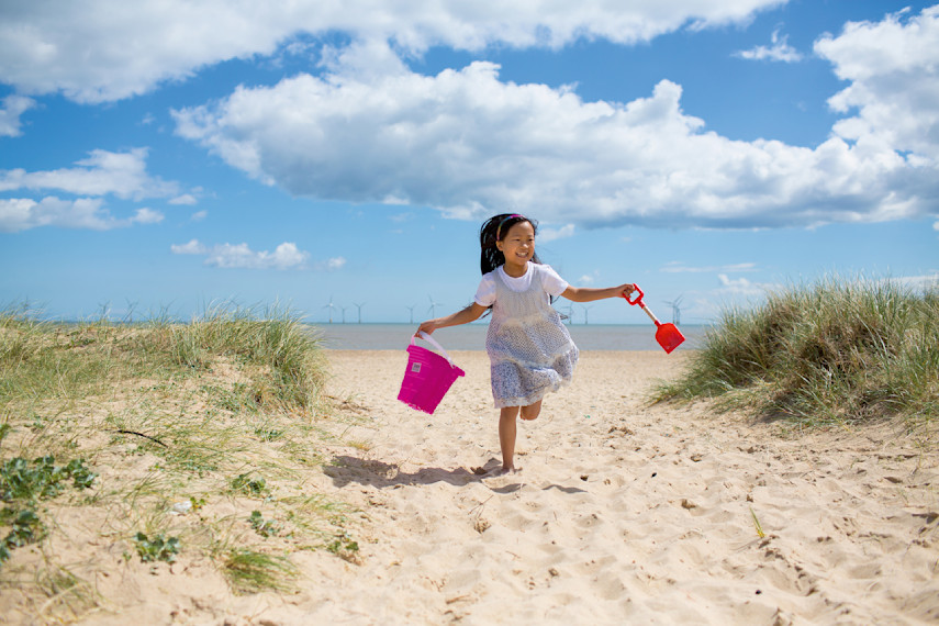 4. Walk along the beach