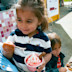 Toddler enjoying an ice cream from Haven's Seaside Treats venue