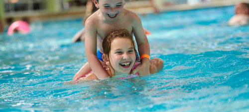 Kids enjoying the indoor pool