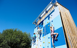 The climbing wall one side, The Jump on the other