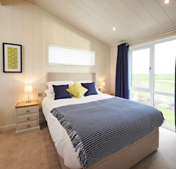 An example of a Lodge master bedroom.