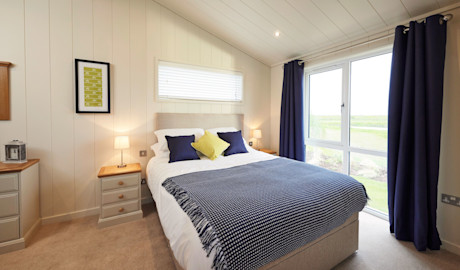 An example of a Lodge master bedroom.