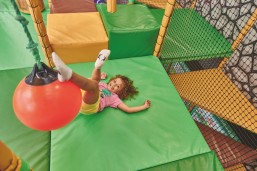 Playing in the brightly coloured soft play at Hafan y Mor, North Wales