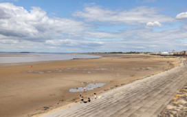 The beach and promenade opposite the park