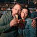 A couple enjoying food and drink at a Haven restaurant