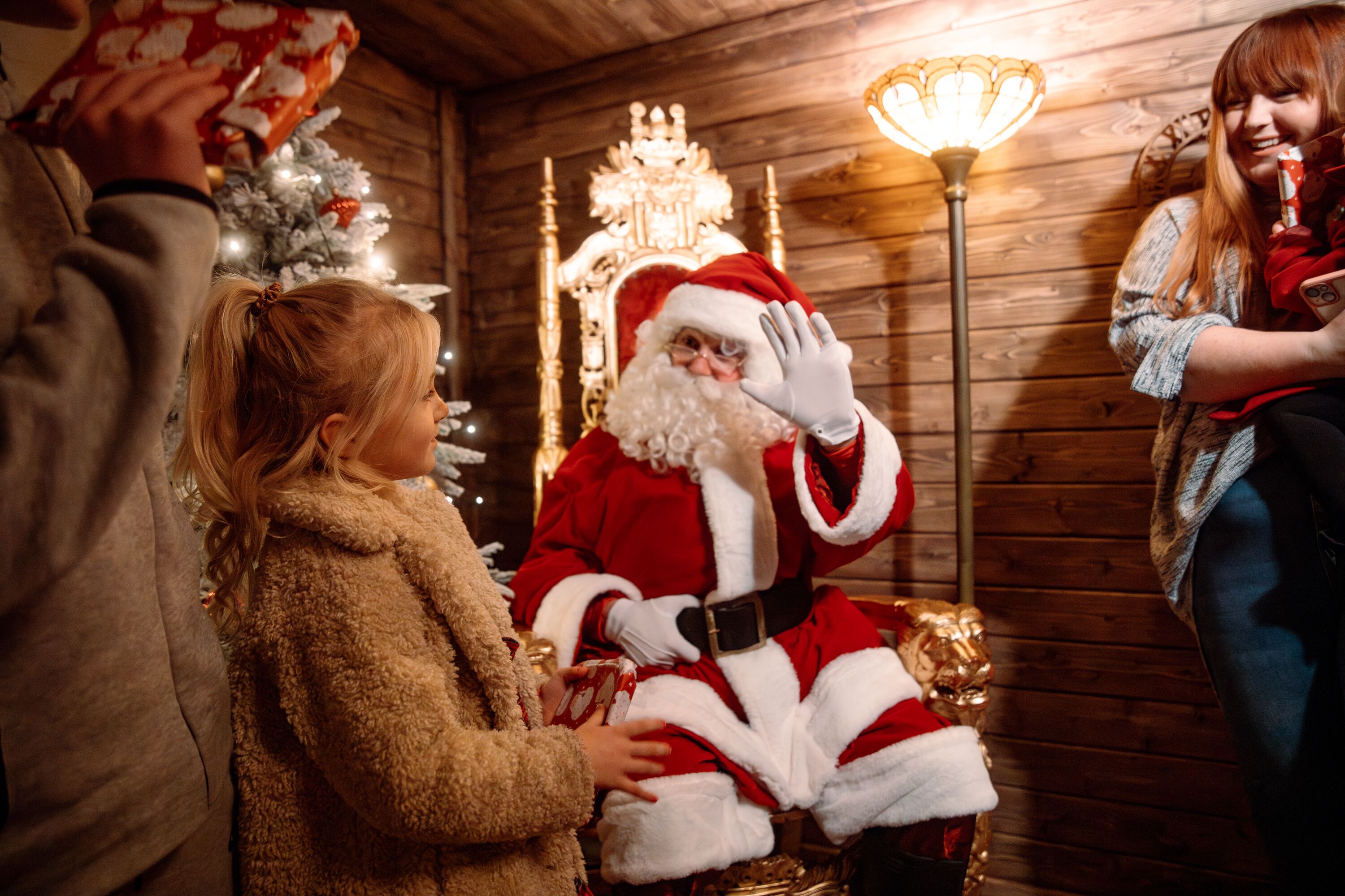 Children meet Santa inside his Grotto on one of Haven's parks.