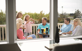 Owner's family relaxing on their decking