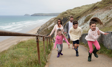 Family by the beach at Perran Sands