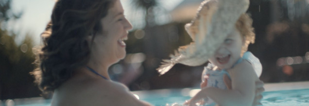 An image of a mother playing with her daughter in a Haven swimming pool