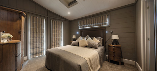 Representation of a main bedroom in a Exclusive Sea View Luxury Lodge
