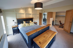 Representation of a main bedroom in a Exclusive Sea View Luxury Lodge