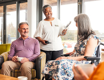 Haven staff speak to prospective new caravan owners.