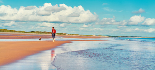 Walking along a Northumberland beach