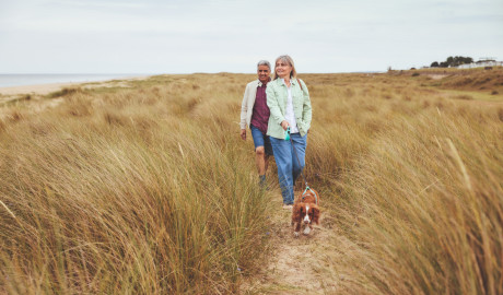 Walking the dog at Seashore, Norfolk