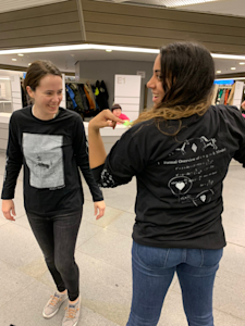 Wearing Uniswap shirts at Devcon