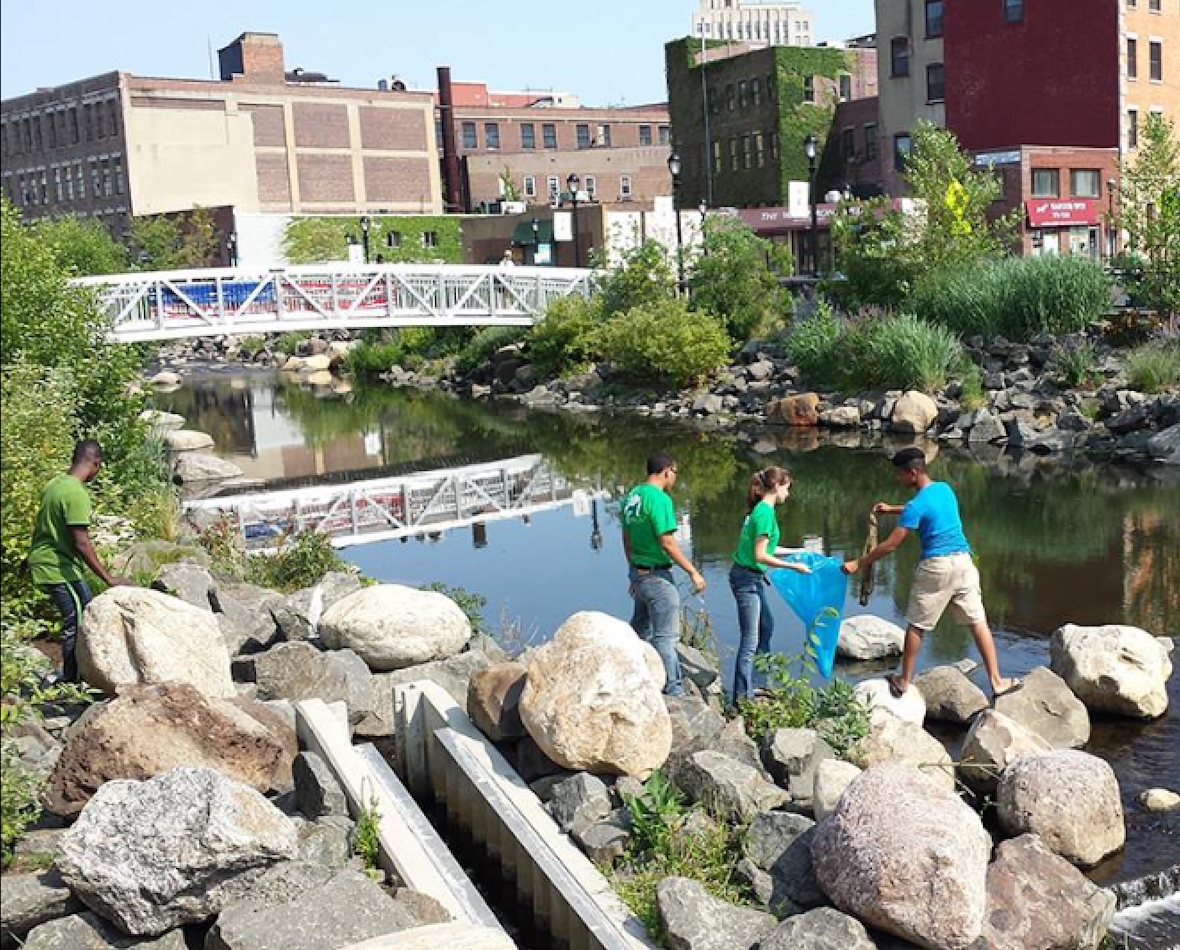 Members of Groundwork Hudson Valley cleaning up the Saw Mill River in Yonkers