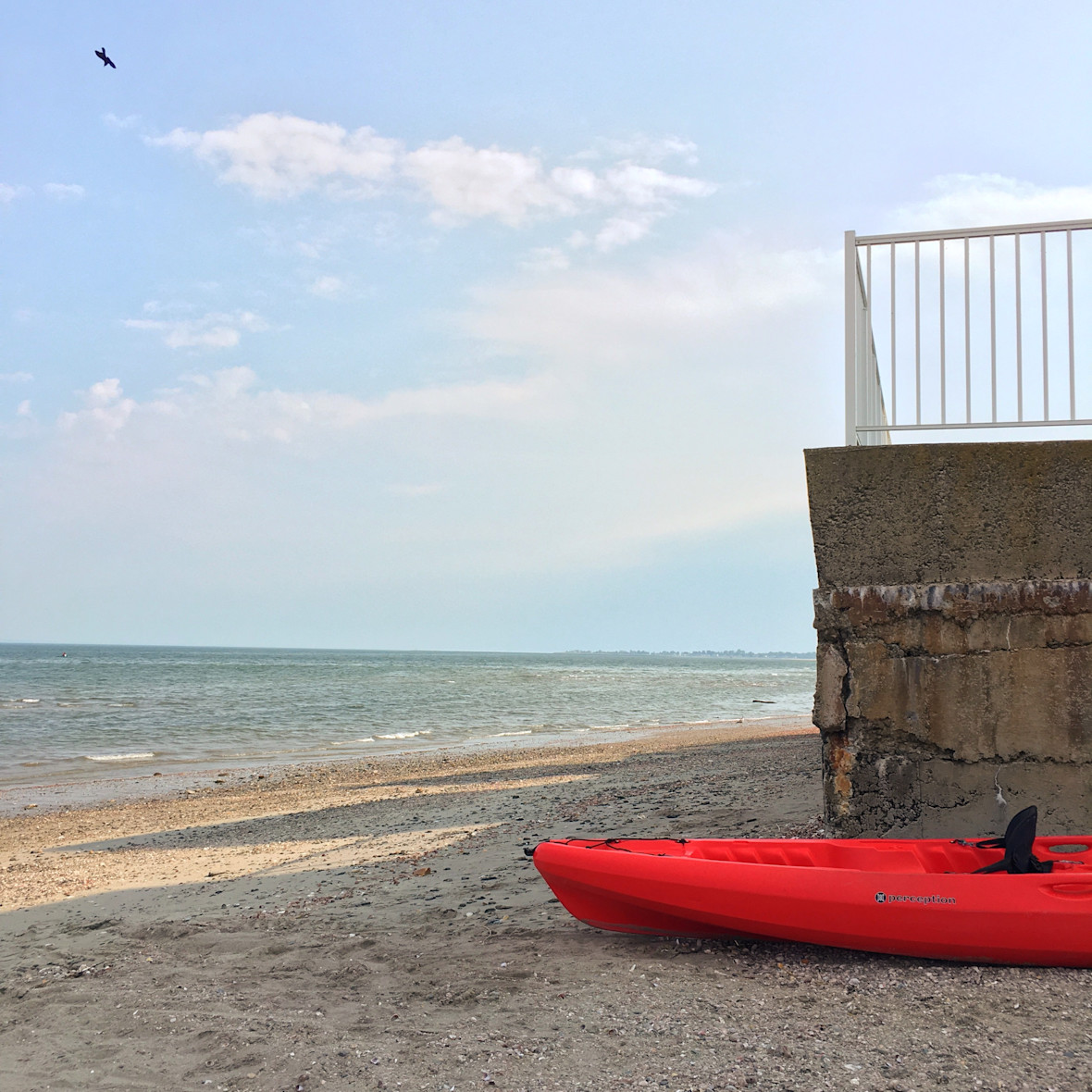 Shoreline with kayak from Scoot & Paddle