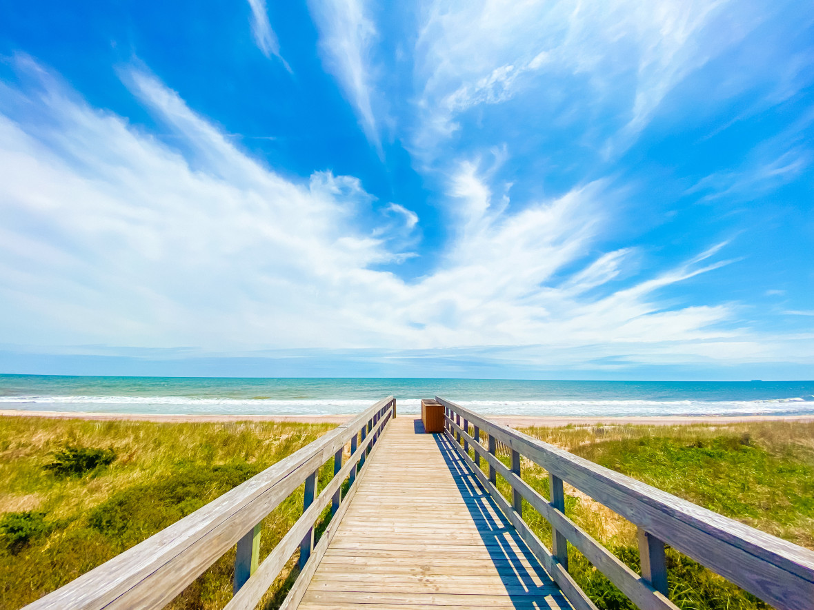 A dock walkway to the beach shore on Fire Island