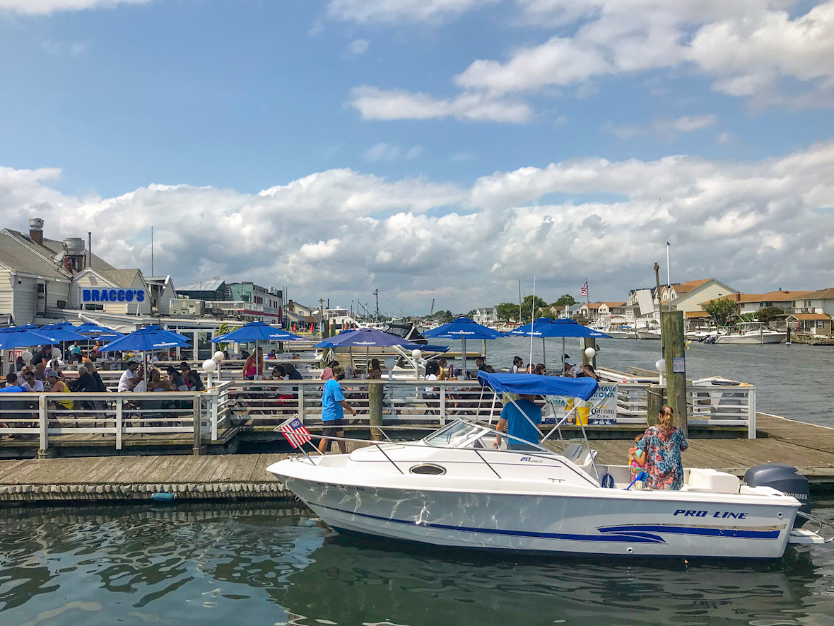 Boat pulling up to dock of Bracco's in Freeport