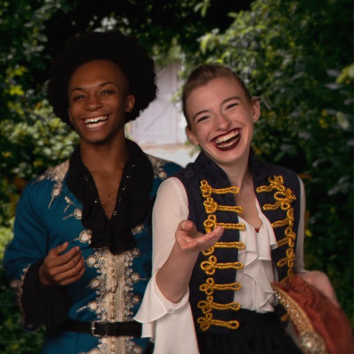 Two women in Renaissance-style costumes from Kingdom Faire