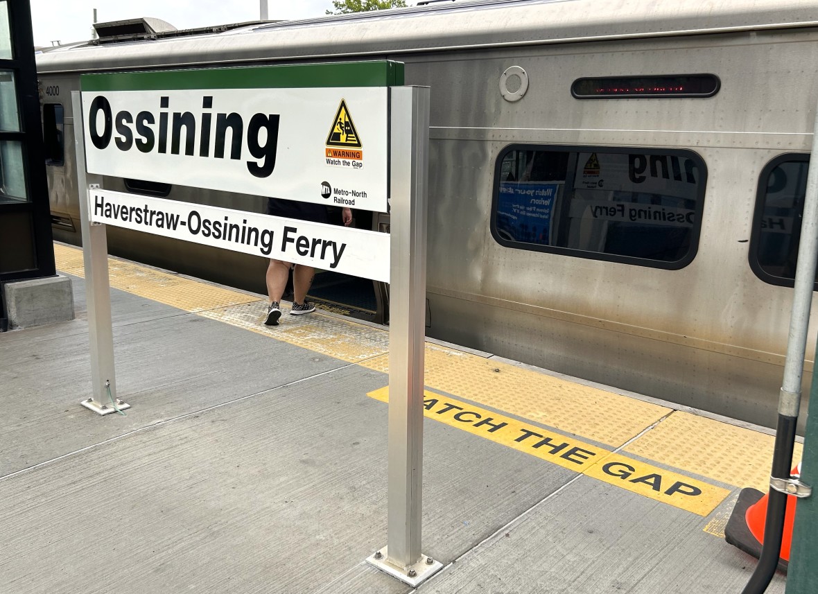 Ossining MNR platform sign with train