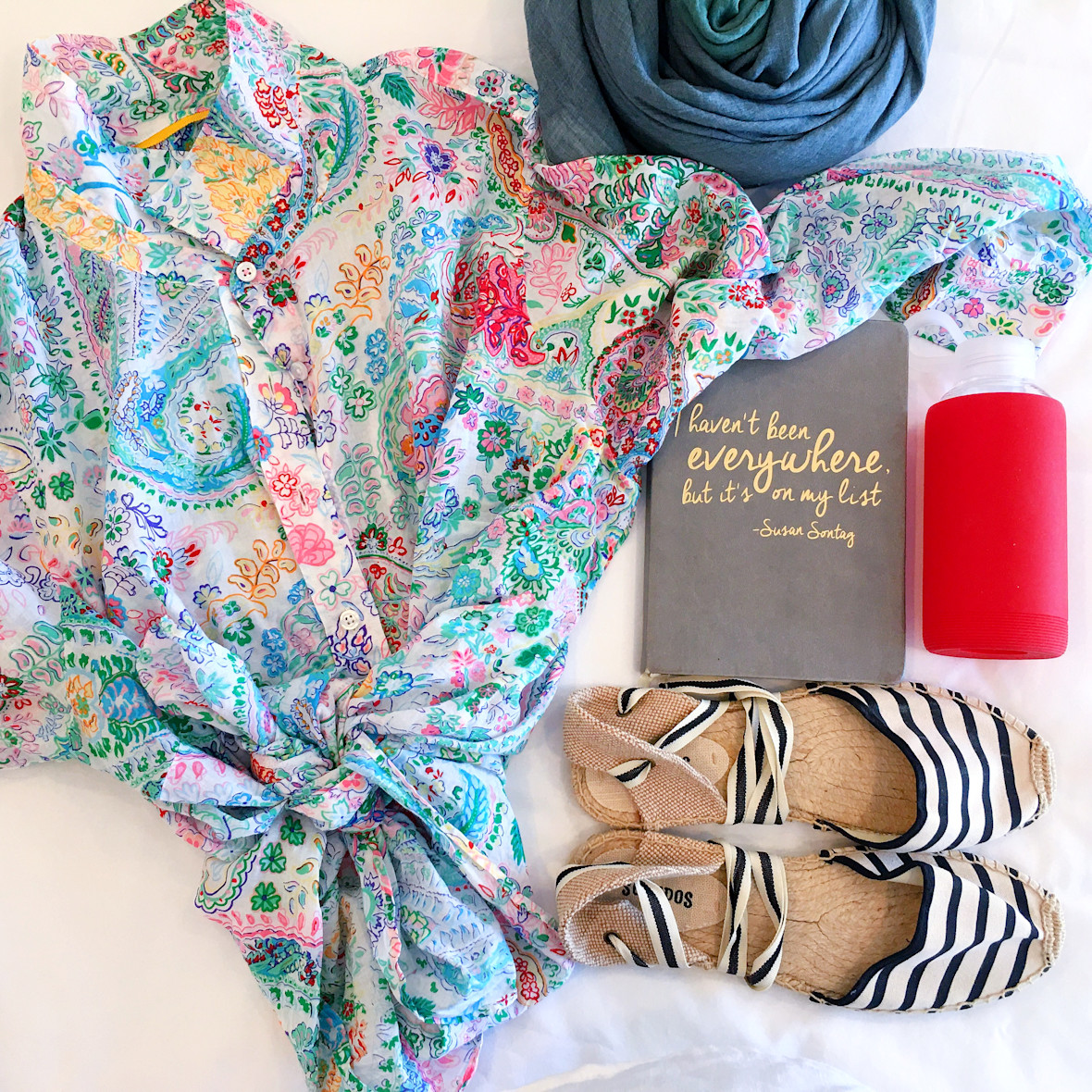 Overhead of outfit essentials for her trip to Stratford