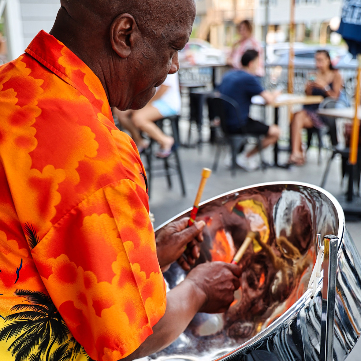 Man playing steel drums at Little Pub